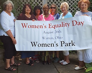 Women’s Equality Day will be celebrated in Warren on Aug. 26. It is being sponsored by the League of Women Voters of Trumbull County. Preparing for the event above, from left, are Sandy Mahaffey, Ellen Partin, Jonnah Hetzel, Gloria Rodgers, Danita Davis, Marti Flint and Peggy Boyd.