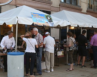 Wine during the Youngstown Jazz and Wine Fest, Saturday, July 8, 2017 in Central Square in downtown Youngstown...(Nikos Frazier | The Vindicator)