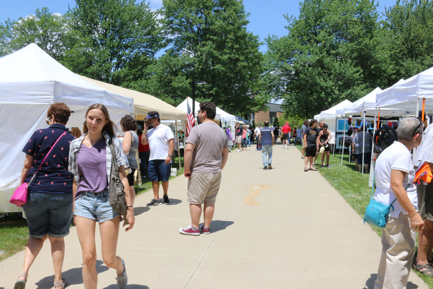 Walkways lined with vendors filled the campus of Youngstown State University during the Summer Festival of the Arts on Saturday afternoon.  Dustin Livesay  |  The Vindicator  7/8/17  Youngstown State University.