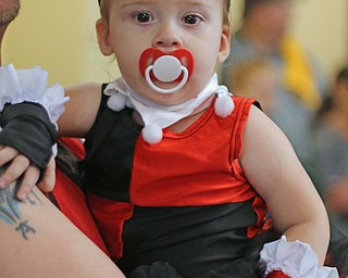 16 month old Harley Colapietro of Girard dressed up as Harley Quinn during the All Americon convention at the Covelli Center in Youngstown on Saturday afternoon.  Dustin Livesay  |  The Vindicator  7/8/17  Covelli Center.