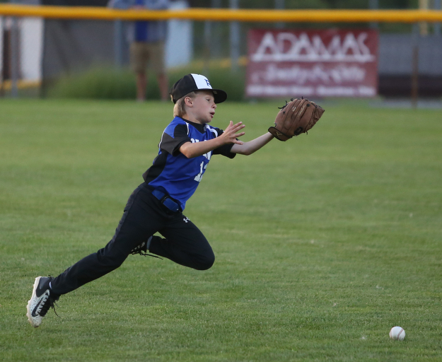 Poland second baseman Tegan McCurdy (12) misses the catch in the first inning against Canfield/Poland, Sunday, July 9, 2017, at Fields of Dreams in Boardman. Canfield won 11-0...(Nikos Frazier | The Vindicator)..