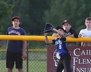 Poland left fielder Ryan Dillulo (9) with the out in the first inning against Canfield/Poland, Sunday, July 9, 2017, at Fields of Dreams in Boardman. Canfield won 11-0...(Nikos Frazier | The Vindicator)..