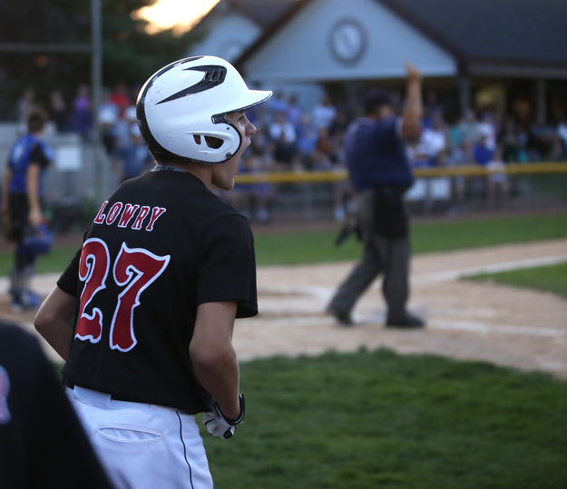 Canfield catcher Broc Lowry (27) cheers on Canfield short stop Ben Slanker (14) after his three run home run in the second inning against Canfield/Poland, Sunday, July 9, 2017, at Fields of Dreams in Boardman. Canfield won 11-0...(Nikos Frazier | The Vindicator)..