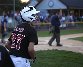 Canfield catcher Broc Lowry (27) cheers on Canfield short stop Ben Slanker (14) after his three run home run in the second inning against Canfield/Poland, Sunday, July 9, 2017, at Fields of Dreams in Boardman. Canfield won 11-0...(Nikos Frazier | The Vindicator)..