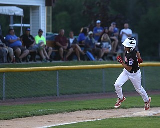 Canfield short stop Ben Slanker (14) rounds third on a three run home run in the second inning against Canfield/Poland, Sunday, July 9, 2017, at Fields of Dreams in Boardman. Canfield won 11-0...(Nikos Frazier | The Vindicator)..