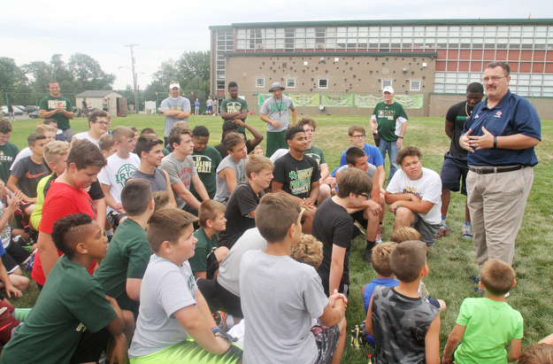 William D Lewis the vindictor   Malone College football coach Frank Thomas speaks to youth during a football camp at Ursuline HS 7-10-17.