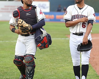 Mahoning Valley Scrappers catcher Jason Rodriguez (20) and Mahoning Valley Scrappers pitcher Danny Salazar (6) walk towards the dugout before the Mahoning Valley Scrappers take on the Brooklyn Cyclones, Tuesday, July 11, 2017, at Eastwood Field in Niles...(Nikos Frazier | The Vindicator)..