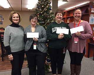 The Austintown Alumni Association awarded teachers $1,000 in mini-grants for this school year. Funding for these grants is made possible by the association’s annual raffle and by donations from alumni and friends. The grants will be used for classroom and student instruction. For membership information, contact Lynn Larson, alumni president, at 330-518-5727, or Patti Griffin at 330-793-4799. Above, from left, are Larson, April King, Patricia Hartsough and Amanda Shrader for Austintown Fitch High School, and below, from left, Monica Theis, Larson and Alicia Burnfield for Austintown Intermediate School. Also awarded mini-grants were Julie Toth of Austintown Elementary School and Melody Ward from Austintown Middle School.