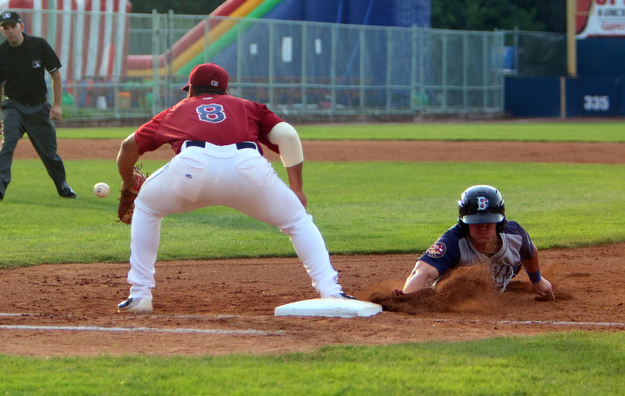Scrappers first basemen Ulysses Cantu (8) reaches for the ball as Brooklyn's Reed Gamache (11) slides in safely during Wednesday nights matchup at Eastwood Field.   Dustin Livesay  |  The Vindicator  7/12/17  Eastwood Field.