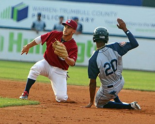 Scrappers short stop Jesse Berardi (32) catches a ball at second base just missing the tag out on Brooklyns Jose Miguel Medina (20) during Wednesday nights matchup at Eastwood Field.   Dustin Livesay  |  The Vindicator  7/12/17  Eastwood Field.