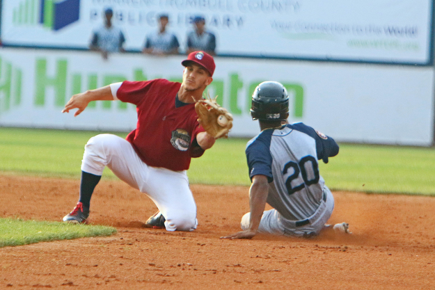 Scrappers short stop Jesse Berardi (32) catches a ball at second base just missing the tag out on Brooklyns Jose Miguel Medina (20) during Wednesday nights matchup at Eastwood Field.   Dustin Livesay  |  The Vindicator  7/12/17  Eastwood Field.