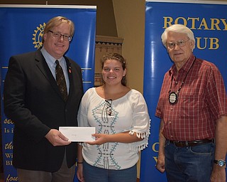 The Rotary Club of Youngstown recently honored Macey Stancato of West Branch Middle School. Macey, grand champion of the 2017 Vindicator Regional Spelling Bee, was presented with a Barnes and Noble gift card by president William Lawson, left, and incoming president Frank Kishel. The club also celebrated the 50th anniversary of the founding of the local Rotary Foundation.
