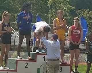 Neighbors | Submitted.Mia Musolino from Poland Middle School received a medal for winning first place at State in Colmbus for track.