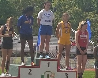 Neighbors | Submitted.Mia Musolino from Poland Middle School stood on the first place podium after winning the OHSAA State Track Championship.