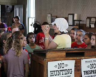 Neighbors | Abby Slanker.C.H. Campbell Elementary School third-grade students listened as Suzie McCabe, Canfield Historical Society president, explained the history of the Mahoning Dispatch during the school’s annual Canfield History Walking Tour on May 30.