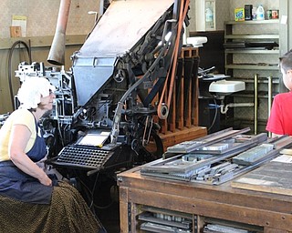Neighbors | Abby Slanker.Canfield Historical Society president Suzie McCabe spoke to C.H. Campbell Elementary School third-grade students about the evolution of the printing industry at the Mahoning Dispatch during the school’s annual Canfield History Walking Tour on May 30.