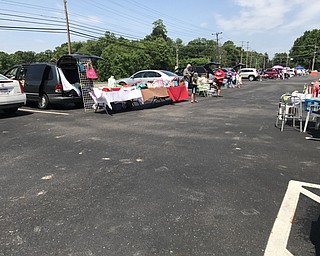 Neighbors | Alexis Bartolomucci.Tables and trunks were full of items people were selling during the Treasures of the Trunk sale on June 10 hosted by the Poland Lions Club.