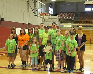 Neighbors | Alexis Bartolomucci.The riders and volunteers took a picture together as they finished the iCan Bike camp on June 23 at Glenwood Middle School.