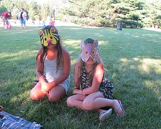 Neighbors | Alexis Bartolomucci.Sophia and Gracie wore animal masks they decorated at the Family Night in the Park on July 8 at Boardman Park.