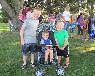 Neighbors | Alexis Bartolomucci.Children enjoyed getting balloons made by Jocko the Balloon Man and all the other activities the Family Night in the Park had to offer. Pictured are, from left, Logan Sigworth, Grant Pavlicko and Landon Sigworth.