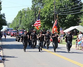 Neighbors | Abby Slanker.The 52nd annual Canfield Fourth of July Parade kicked off with law enforcement officials carrying the American flag and the Ohio state flag.