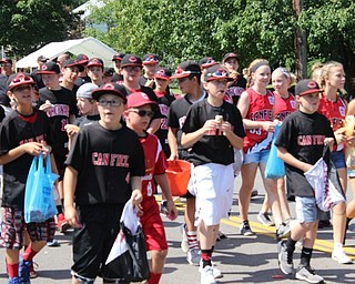 Neighbors | Abby Slanker.Members of the Canfield Baseball Club marched in the annual Canfield Fourth of July Parade. Many people came out to the parade to cheer on those participating in the parade.