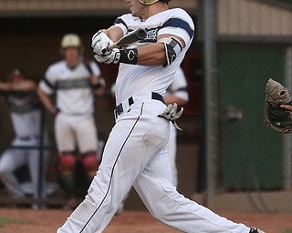 Golden Spikes center fielder Josh Gibson (20) swings in the first inning as Creekside Fitness takes on the Golden Spikes, Friday, July 14, 2017, at Bob Cene Park in Struthers...(Nikos Frazier | The Vindicator)..