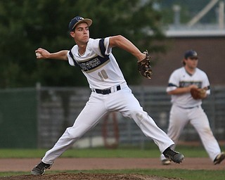Golden Spikes pitcher Jimmie Clark (10) throws in the first inning as Creekside Fitness takes on the Golden Spikes, Friday, July 14, 2017, at Bob Cene Park in Struthers...(Nikos Frazier | The Vindicator)..