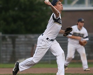 Golden Spikes pitcher Jimmie Clark (10) throws in the first inning as Creekside Fitness takes on the Golden Spikes, Friday, July 14, 2017, at Bob Cene Park in Struthers...(Nikos Frazier | The Vindicator)..