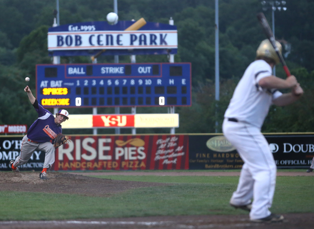 Creekside pitcher TJ Deshield (22) fires to Golden Spikes first baseman Donny Watters (17) in the second inning as Creekside Fitness takes on the Golden Spikes, Friday, July 14, 2017, at Bob Cene Park in Struthers...(Nikos Frazier | The Vindicator)..