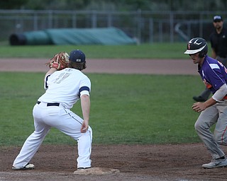 Creekside right fielder Eric Sapp (23) runs back to first as Golden Spikes first baseman Donny Watters (17) waits for the ball in the second inning as Creekside Fitness takes on the Golden Spikes, Friday, July 14, 2017, at Bob Cene Park in Struthers...(Nikos Frazier | The Vindicator)..