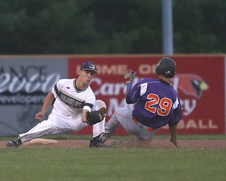 Creekside left fielder Aex Hernandez (29) slides safe into second past Golden Spikes short stop Charles Winans (22) in the third inning as Creekside Fitness takes on the Golden Spikes, Friday, July 14, 2017, at Bob Cene Park in Struthers...(Nikos Frazier | The Vindicator)..