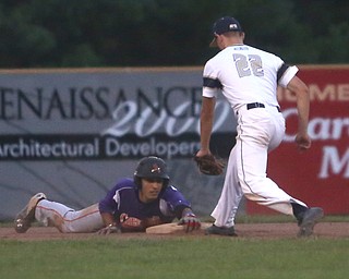 Creekside left fielder Aex Hernandez (29) slides safe into second past Golden Spikes short stop Charles Winans (22) in the third inning as Creekside Fitness takes on the Golden Spikes, Friday, July 14, 2017, at Bob Cene Park in Struthers...(Nikos Frazier | The Vindicator)..