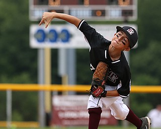 MICHAEL G TAYLOR | THE VINDICATOR-7-15-17  BASEBALL 8-10 yrs. Ohio D2 Championship- Boardman Spartans vs Canfield Cardinals at Field of Dreams in Boardman, OH. 1st, Boardman's #7 Anthony Triveri fires a pitch homeward.