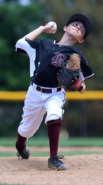 MICHAEL G TAYLOR | THE VINDICATOR-7-15-17  BASEBALL 8-10 yrs. Ohio D2 Championship- Boardman vs Canfield at Field of Dreams in Boardman, OH. 5th, Boardman's #7 Anthony Triveri fires a pitch homeward.
