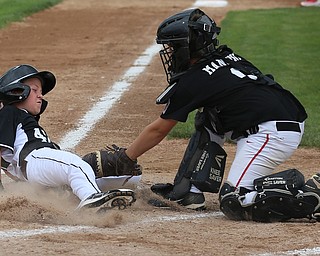 MICHAEL G TAYLOR | THE VINDICATOR-7-15-17  BASEBALL 8-10 yrs. Ohio D2 Championship- Boardman Spartans vs Canfield Cardinals at Field of Dreams in Boardman, OH. 2nd, Boardman's #42 Mikey Demetrios slides safely into home under the tag of Canfield #9 Dylan Mancini