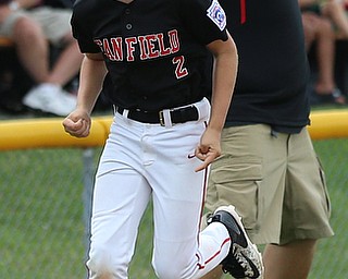 MICHAEL G TAYLOR | THE VINDICATOR-7-15-17  BASEBALL 8-10 yrs. Ohio D2 Championship- Boardman vs Canfield at Field of Dreams in Boardman, OH. 2nd, Canfield's #2 Nicholas Lavanty heads home to score.