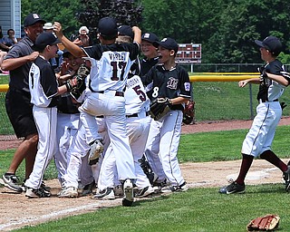 MICHAEL G TAYLOR | THE VINDICATOR-7-15-17  BASEBALL 8-10 yrs. Ohio D2 Championship- Boardman Spartans vs Canfield Cardinals at Field of Dreams in Boardman, OH.  Boardman celebrates their victory.
