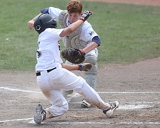 Baird Brothers catcher Connor Meyer (12) tags out Brooklyn Bonnie Paws pitcher Thomas Pallazoito (1) in the first inning as the Baird Brothers take on the Brooklyn Bonnie Paws in the 14u NABF World Series Championship, Sunday, July 16, 2017, at Cene Park in Struthers. Brooklyn won 2-0...(Nikos Frazier | The Vindicator)..