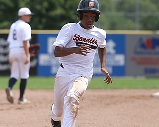 Brooklyn Bonnie Paws right fielder Tony Holden (10) steals to third in the fourth inning as the Baird Brothers take on the Brooklyn Bonnie Paws in the 14u NABF World Series Championship, Sunday, July 16, 2017, at Cene Park in Struthers. Brooklyn won 2-0...(Nikos Frazier | The Vindicator)..