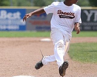Brooklyn Bonnie Paws right fielder Tony Holden (10) steals to third in the fourth inning as the Baird Brothers take on the Brooklyn Bonnie Paws in the 14u NABF World Series Championship, Sunday, July 16, 2017, at Cene Park in Struthers. Brooklyn won 2-0...(Nikos Frazier | The Vindicator)..