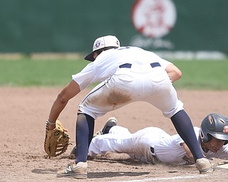 Brooklyn Bonnie Paws second baseman Samuel Urena (5) slides back into first as Baird Brothers first baseman Jake Gehring (9) waits for the ball in the fifth inning as the Baird Brothers take on the Brooklyn Bonnie Paws in the 14u NABF World Series Championship, Sunday, July 16, 2017, at Cene Park in Struthers. Brooklyn won 2-0...(Nikos Frazier | The Vindicator)..