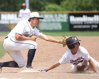 Baird Brothers first baseman Jake Gehring (9) tags out Brooklyn Bonnie Paws pitcher Thomas Pallazoito (1) in the sixth inning as the Baird Brothers take on the Brooklyn Bonnie Paws in the 14u NABF World Series Championship, Sunday, July 16, 2017, at Cene Park in Struthers. Brooklyn won 2-0...(Nikos Frazier | The Vindicator)..