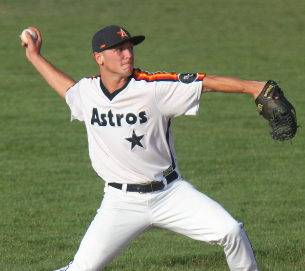 William D. Lewis The Vindicator Astro'sSS Wyatt Larimer makes the throw to first during1rst game at Cene 7-17-17.