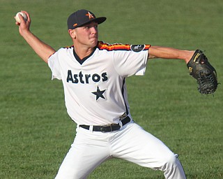 William D. Lewis The Vindicator Astro'sSS Wyatt Larimer makes the throw to first during1rst game at Cene 7-17-17.