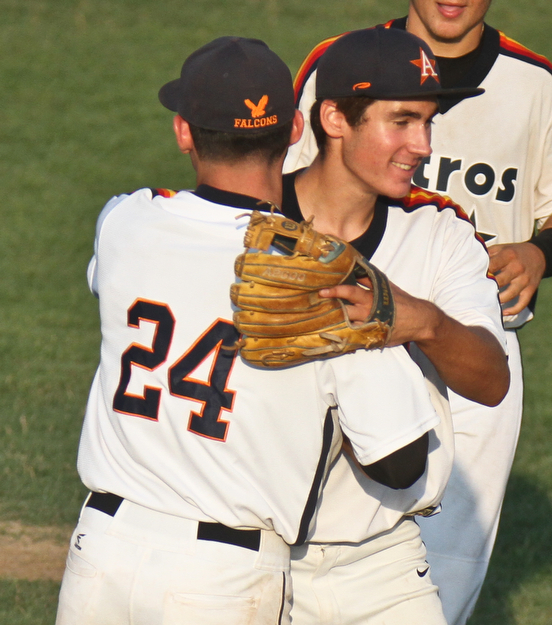 William D. Lewis The Vindicator Astro'spitcher Dylan rotz(8) gets congrats from MAtt Gibson(24) after winning  1rst game at Cene 7-17-17.