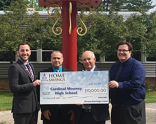 Home Savings Charitable Foundation recently donated $10,000 to Cardinal Mooney High School to be used for the auditorium enhancement and programming campaign. Pictured above from left are Mark Oles, president, Cardinal Mooney High School; Frank Constantino, branch manager, Home Savings Boardman office; Frank Hierro, Mahoning Valley Regional president; and Mike Latessa, vice president of institutional advancement, Cardinal Mooney High School.