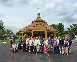 St. Mary Byzantine Catholic Church parishioners gather around the new Ascension Chapel in the parish’s nearly 115-year-old cemetery at 128 S. Schenley Ave., Youngstown.