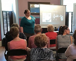 Traci Manning of the Mahoning Valley Historical Society addressed the audience at a recent Upton Association open house. The next open house will take place Aug. 6, and The Upton House is at 380 Mahoning Ave. NW, Warren. The association sells bricks for the Women’s Park and rents out the house for small group parties. For more information, phone 330-395-1840.