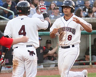 William D. Lewis the vindicator Scrappers gianpaul Gonzalez(4) andUlysses Cantu(8) hi 5 after scoring during 7-18-17 game with Batavia.07182017 wdl scrapeprs score b..
